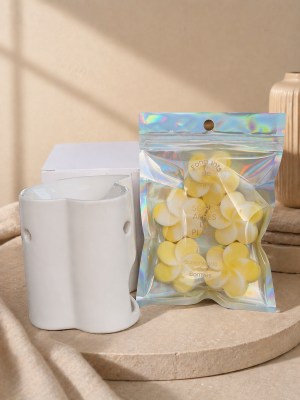 Coffret  UN BRULE PARFUM UN SACHET DE 5 FONDANTS DE CIRE SOIREE APRES LA PLAGE