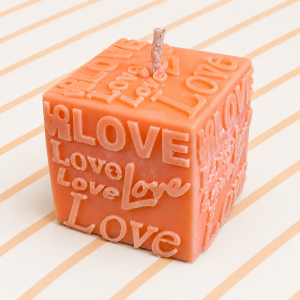 Bougie cube PÊCHE MONOÏ